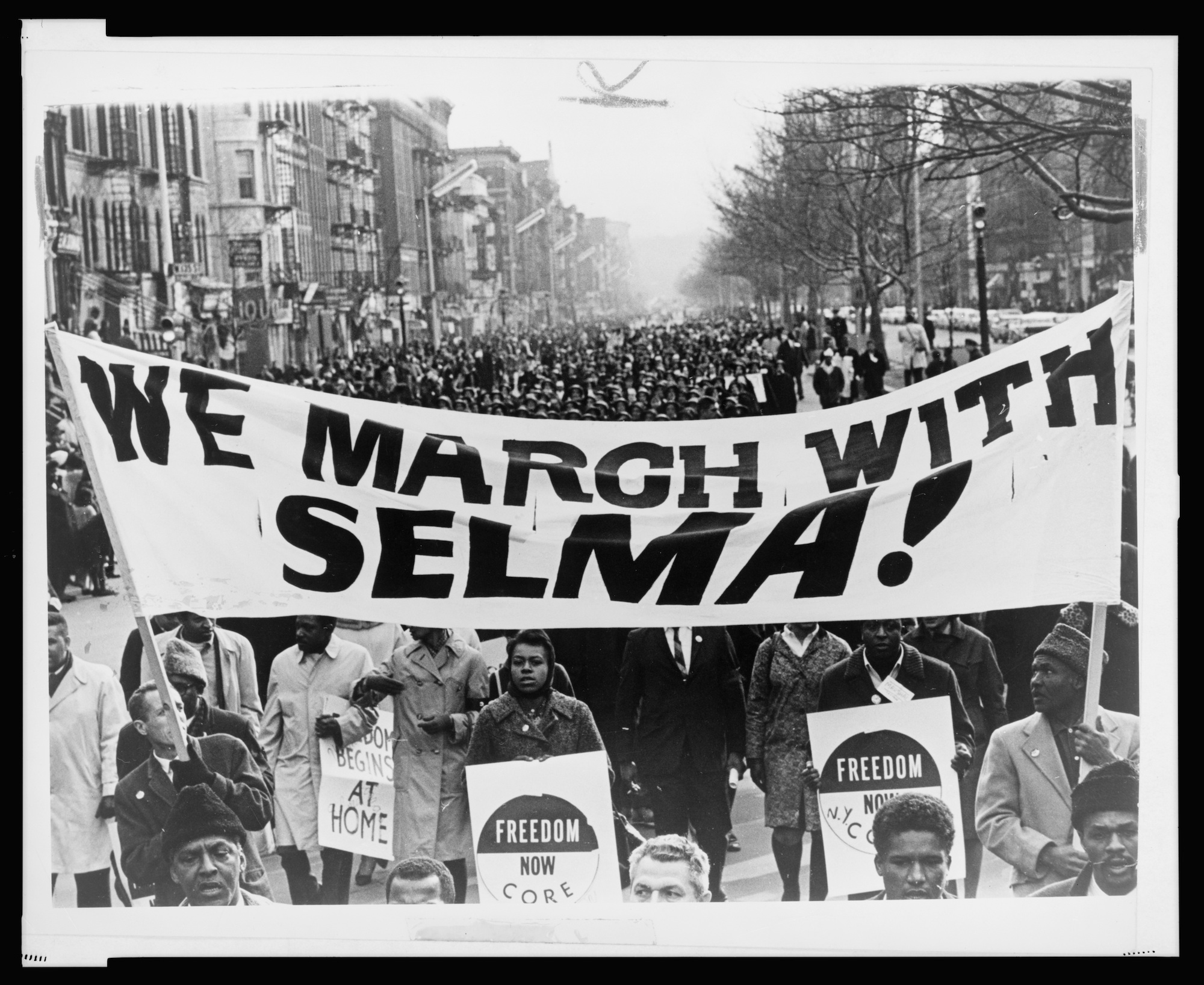 Marchers Carrying Banner